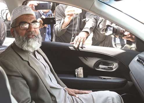 Ameen Ansari, the father of six-year-old Zainab Fatima Ameen, leaves following the court verdict in Lahore yesterday.