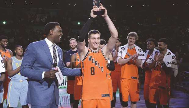 Bogdan Bogdanovic of the World Team celebrates with the u2018Rising Stars Challenge MVP Trophyu2019 during the 2018 Mountain Dew Kickstart Rising Stars Game at Staples Centre in Los Angeles, California. (Getty Images/AFP)