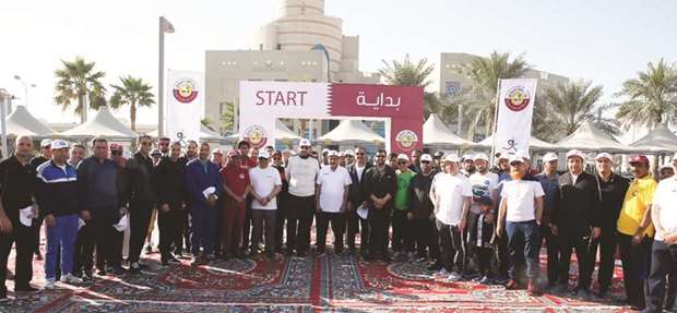 Dignitaries and other participants of the QCB walkathon during National Sport Day.