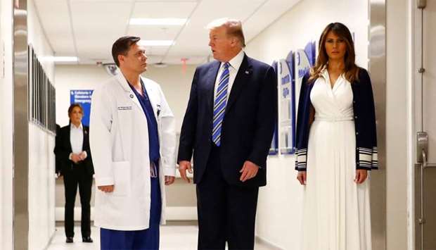 US President Donald Trump and first lady Melania Trump visit with medical staff of Broward Health North Hospital in the wake of the shooting at Marjory Stoneman Douglas High School in Pompano Beach