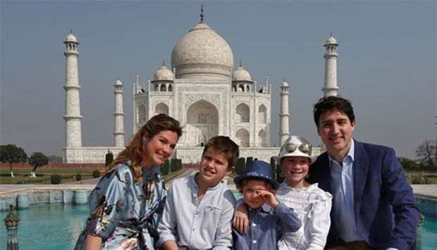 Canadian Prime Minister Justin Trudeau, his wife Sophie Gregoire Trudeau, their daughter Ella-Grace and sons Hadrien and Xavier pose in front of the Taj Mahal in Agra on Sunday.