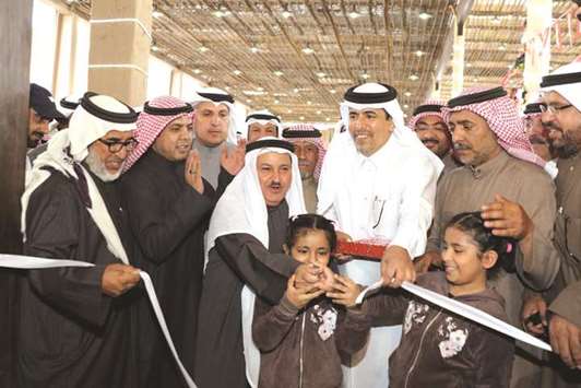 Adviser to the Emir of Kuwait Sheikh Sabah al-Ahmad al-Jaber al-Sabah Mohamed Dhaifallah Sharar inaugurating Qataru2019s pavilion at the Gulf Popular Heritage Festival in Kuwait.