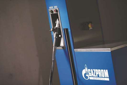 A compressed natural gas fuel pump, operated by Gazprom Neft, sits on display during the Volkswagen CNG Mobility Day in Essen, Germany on November 7, 2017. A controversial pipeline plan that would increase the supply of Russian gas to German industry is dangerous for Europe, says the US deputy energy secretary.