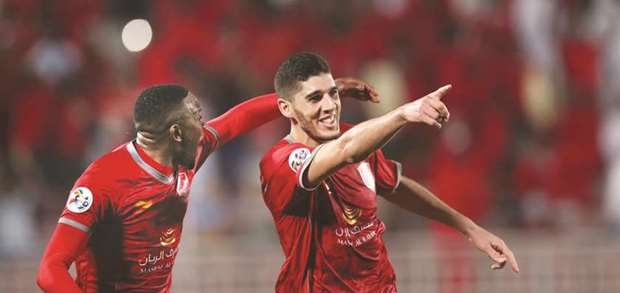Al Duhail's Karim Boudiaf (R) scored two goals for his team against Iran's Zobahan last week.
