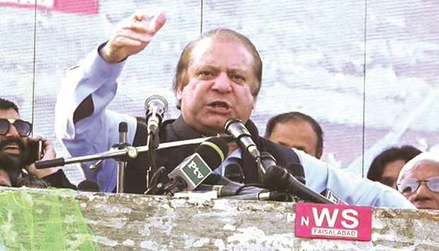PML-N Nawaz Sharif addressing a gathering of supporters at Sheikhupura, 328km from Islamabad, yesterday.