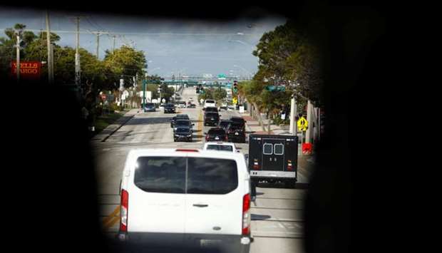The motorcade of US President Donald Trump is seen en route to Trump International Golf Club in West Palm Beach, Florida.