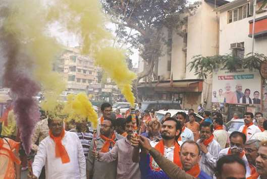 BJP workers celebrate the partyu2019s performance in the Gujarat civic elections in Ahmedabad yesterday.