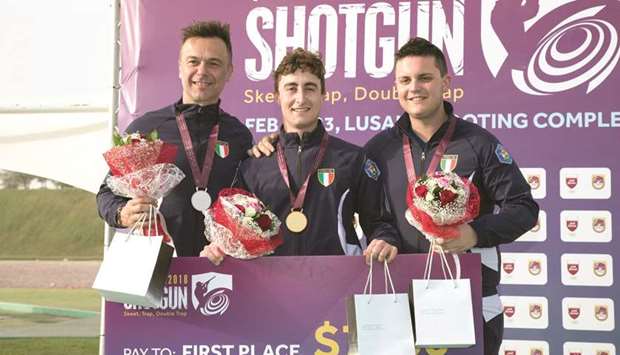 Italyu2019s Andrea Vescovi (centre) won the double trap event ahead of compatriots Daniele di Spigno (left) and Aegnazio Tronca at Qatar Open Shotgun at Lusail Shooting Range yesterday.