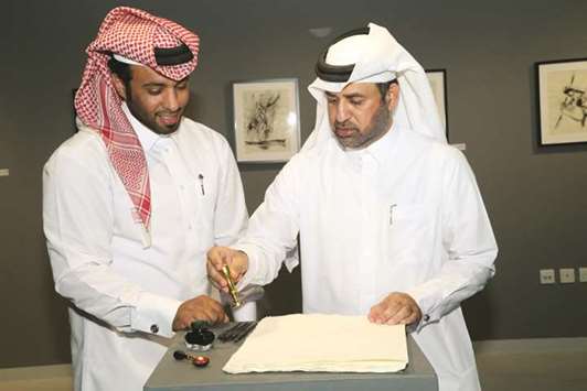 Fahad al-Maadid (left) and Dr Khalid bin Ibrahim al-Sulaiti at the exhibition.