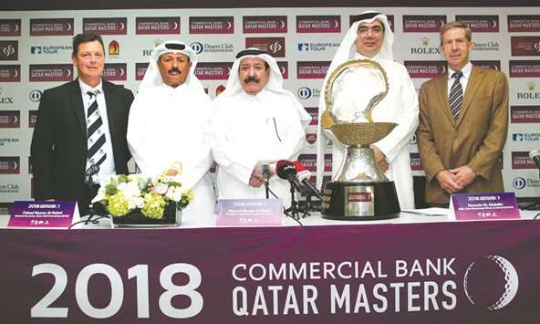 (From left) Doha Golf Club GM Gary McGlinchey, QGA General Secretary Fahad Nasser al-Naimi, President Hassan Nasser al-Naimi, Commercial Bank of Qatar Chief Marketing  Officer Hussein al-Abdulla and European Tour Chief Operating Officer Keith Waters pose with the Commercial Bank Qatar Masters trophy yesterday. PICTURE: Jayaram