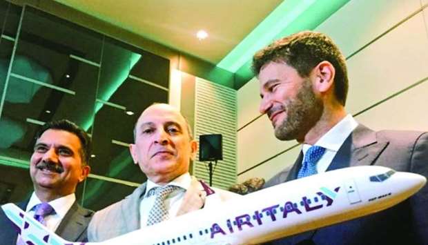 Italian ambassador Pasquale Salzano (right) with Qatar Airways Group chief executive Akbar al-Baker (centre).