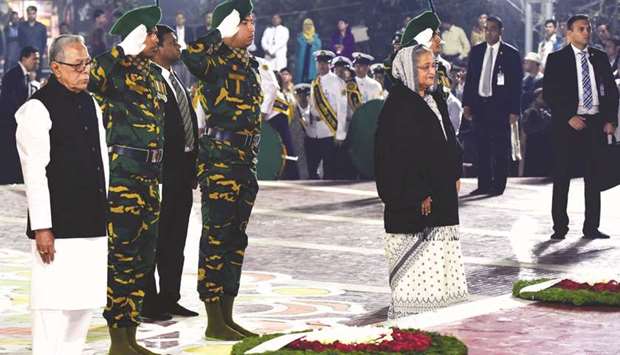 President Abdul Hamid and Prime Minister Sheikh Hasina paying tributes to 1952 Language Movement martyrs in Dhaka yesterday.