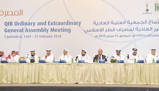 Sheikh Jassim delivers the board of directors report during the banku2019s ordinary and extraordinary annual general meeting held yesterday in Doha. PICTURE: Noushad Thekkayil