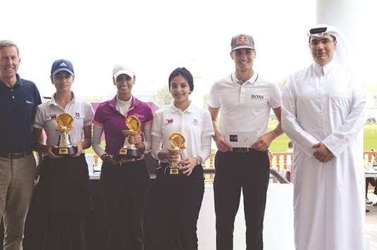The Winning QGA Team of the Commercial Bank Qatar Masters morning Pro-Am with professional Matthias Schwab (Austria), second right, with Hussein Al-Abdulla, Commercial Bank of Qatar, Chief Marketing Officer (right) and Keith Waters, Chief Operating Officer of the European Tour (left).