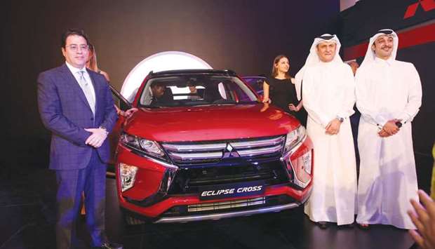 Officials pose with the all-new 2018 Mitsubishi Eclipse Cross at the launch event.