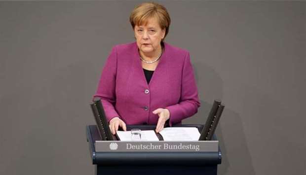 Chancellor Angela Merkel addresses the German parliament in Berlin on Thursday.