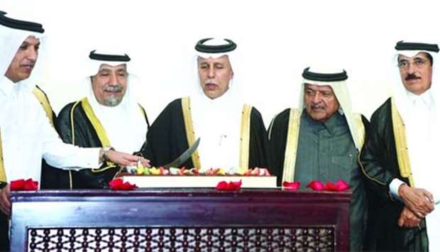 Dignitaries cutting the ceremonial cake at the Kuwait National Day and Liberation Day celebrations yesterday. PICTURES: Ram Chand
