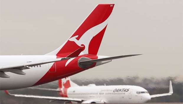 Qantas planes taxi at Kingsford Smith International Airport in Sydney on Thursday.