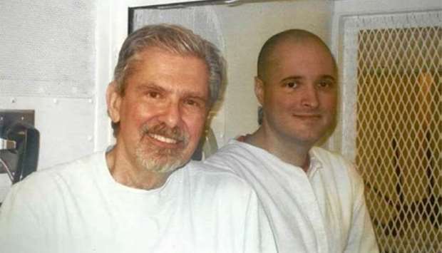 Kent Whitaker (left) and his son Bart during a visit to Bart's prison in Polunsky, Texas.