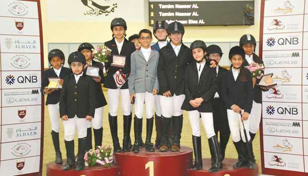 Future Riders are all smiles as they pose after competing during the HH The Emiru2019s Sword Equestrian championship.