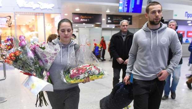 Russian Olympic curlers Alexander Krushelnitsky and his wife Anastasia Bryzgalova return from the Pyeongchang 2018 Winter Olympics