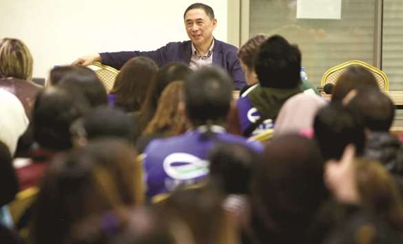 Ciriaco A Lagunzad III (centre), Undersecretary for Workers Protection, Human Resource, and Internal Auditing Services Cluster in the Filipino Department of Labour, speaks during a meeting with the Filipino community at his countryu2019s embassy in Kuwait City, yesterday.