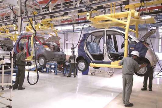 An automobile plant in India. Attitudes toward globalisation and digital technology tend to be more positive in high-growth developing countries like India and China, where progress is highly visible.