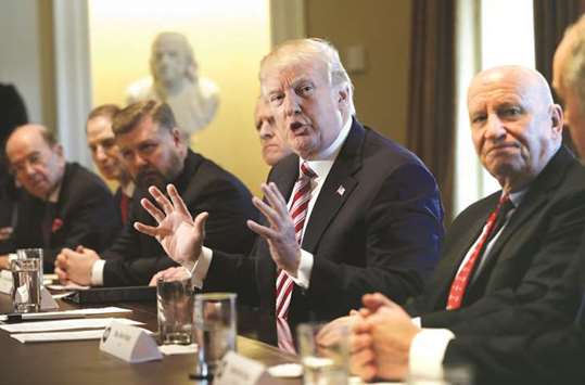 US President Donald Trump speaks during a meeting with bipartisan members of Congress on trade in the Cabinet Room of the White House in Washington, DC, on  February 13. According to sources, Trump has said he wants to slap a global tariff of 24% on steel imports, the most severe of three options presented to him in a report in January. He is also considering as much as a 10% duty on all aluminium entering the US, which would be more than 2.5 percentage points higher than the harshest of Commerceu2019s recommendations.