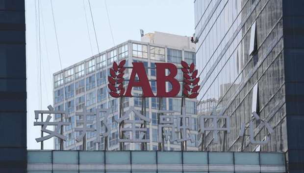 Anbang logo is seen on a building in Beijing. Chinau2019s unprecedented takeover of private insurer Anbang confirms that toxic risks lurk in the worldu2019s second-largest  economy while signalling the stateu2019s tightening grip on China Inc despite reform rhetoric, analysts said yesterday.
