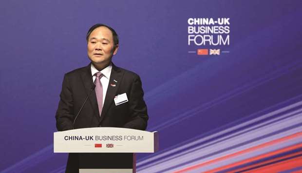 Li Shufu, chairman of Geely Holdings, speaks at the China-UK business forum in Shanghai (file). Li has built up a 9.69% stake in Mercedes-Benz owner Daimler, an  aggressive move designed to open the door for an industrial alliance between the two carmakers.