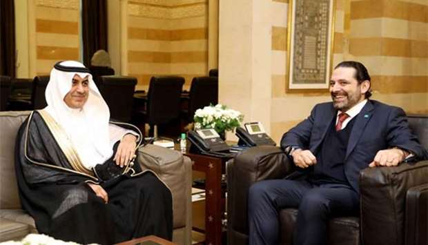 Lebanese Prime Minister Saad Hariri meeting Saudi envoy Nizar al-Aloula in Beirut on Monday.