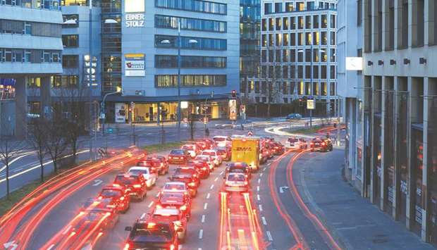 Automobiles leave light trails at dusk on a city centre road in Stuttgart. The judges in Leipzig refused to overturn lower court decisions that pushed Stuttgart and Dusseldorf towards plans that would remove older diesel vehicles from inner cities.