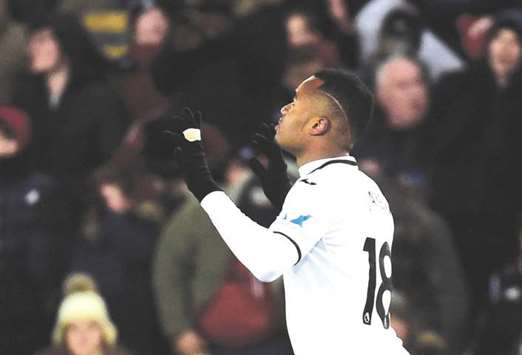 Swansea Cityu2019s Jordan Ayew celebrates after scoring against Sheffield yesterday during their FA Cup fifth round replay match at the Liberty Stadium, Swansea. (Reuters)