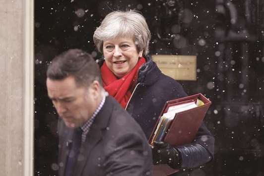 Prime Minister Theresa May leaves 10 Downing street for the weekly Prime Minister Question (PMQ) session in the House of Commons in London.