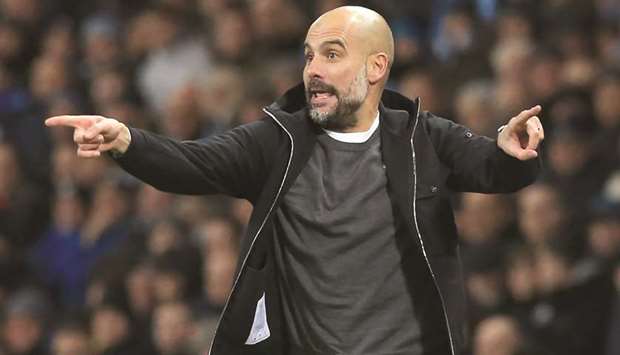 Manchester City manager Pep Guardiola is not ready to crown his side champions, despite his rivals already throwing in the towel. (AFP)