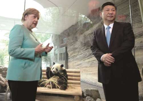 German Chancellor Angela Merkel and Chinese President Xi Jinping at the welcome ceremony for Chinese panda bears Meng Meng and Jiao Qing in Berlin. China has a long tradition of deploying the adorable fuzzy bears as a form of diplomacy.