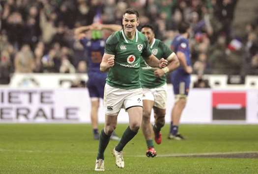 Irelandu2019s Jonathan Sexton celebrates after scoring a drop goal during the Six Nations match against France at the Stade de France in Paris yesterday. (AFP)