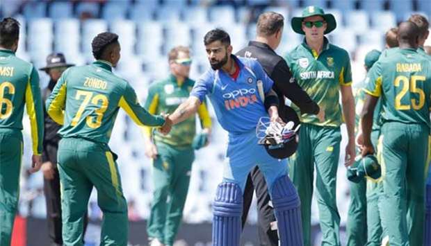 Captain Virat Kohli shakes hand with South Africa's Khaya Zondo after winning the match in Centurion, South Africa on Sunday.