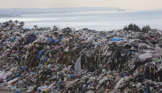 Piled up garbage is seen in Jiyeh, Lebanon