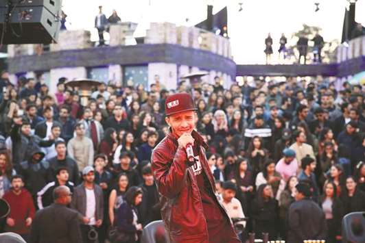 DJ Khalifa of Lyari Underground, a Pakistani rap group, performs at Diplou2019s Mad Decent Block Party at The Rock Musicarium in Islamabad yesterday.