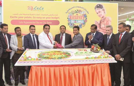 Sri Lankan ambassador ASP Liyanage, LuLu Group International director Mohamed Althaf and other dignitaries and officials at the festivalu2019s inauguration at LuLu Hypermarket, Barwa City yesterday. PICTURE: Noushad Thekkayil