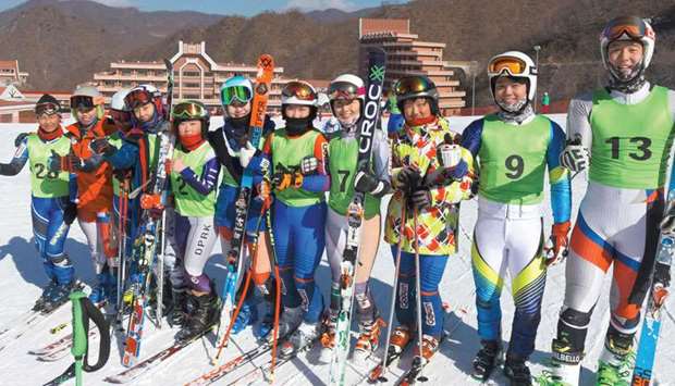 North and South Korean skiers pose for a photo during a joint training session at the Masikryong, or Masik passu2019 ski resort, near North Koreau2019s east coast port city of Wonsan on February 1.
