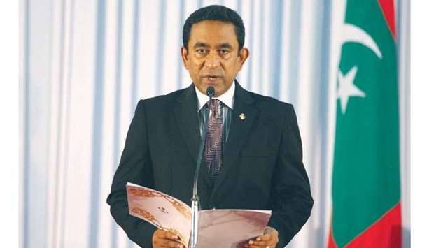 In this file photo, Abdulla Yameen takes oath as the president of Maldives during a swearing-in ceremony at the parliament in Male in 2013.