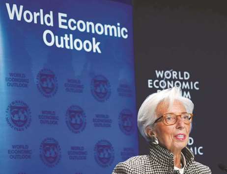 IMF managing director, Christine Lagarde attends a news conference on the world economic outlook during the World Economic Forum (WEF) annual meeting in Davos, Switzerland yesterday.
