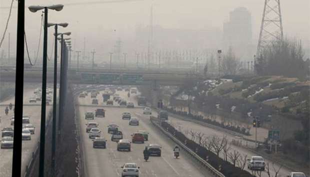 A blanket of thick smog envelops Tehran as heavy pollution hit new highs on Monday.