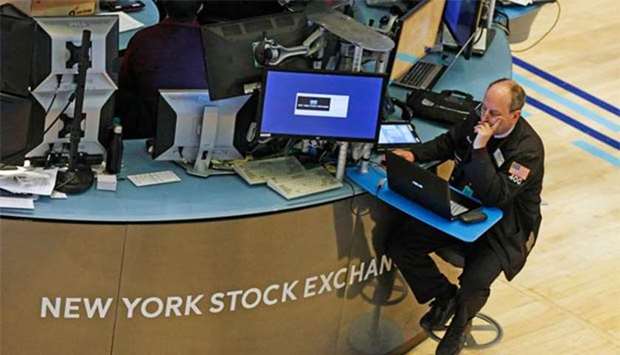 A trader works on the floor of the New York Stock Exchange on Tuesday.