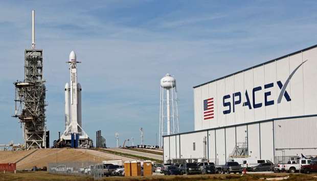 A SpaceX Falcon Heavy rocket stands on historic launch pad 39A as it is readied for its first demonstration flight at the Kennedy Space Center in Cape Canaveral, Florida.
