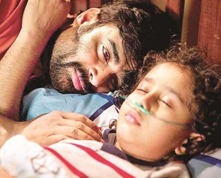 CONCERNED: Madhavan, left, in a scene from Amazon Prime live-action series, Breathe. He plays as a concerned father of a seriously ill son.