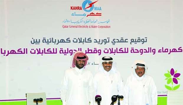 Sheikh Fahd bin Hamad bin Jassim al-Thani, Essa bin Hilal al-Kuwari, and Sheikh Faisal bin Qassim al-Thani at the signing ceremony on Wednesday.