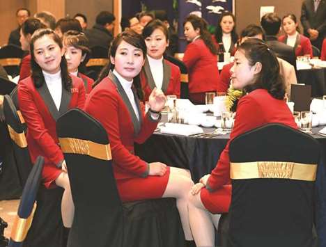 North Korean cheerleaders attend a welcome banquet at the Inje Speedium resort complex in Inje county, north of Pyeongchang, ahead of the Winter Olympic Games. (AFP)